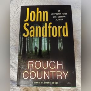 "Rough Country" by John Sandford NYT best selling author.